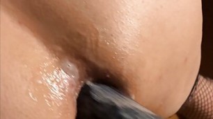 Close Up Mistress fucks and spanks sissys ass with black dildo