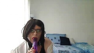 MILF tranny simulates a Blowjob by playing with a vibrator